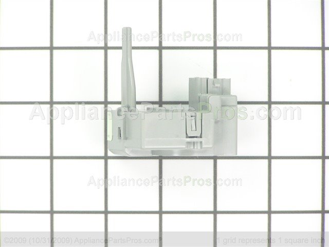 Gray plastic Whirlpool compressor start relay, part WPW10197428, on a one-inch grid